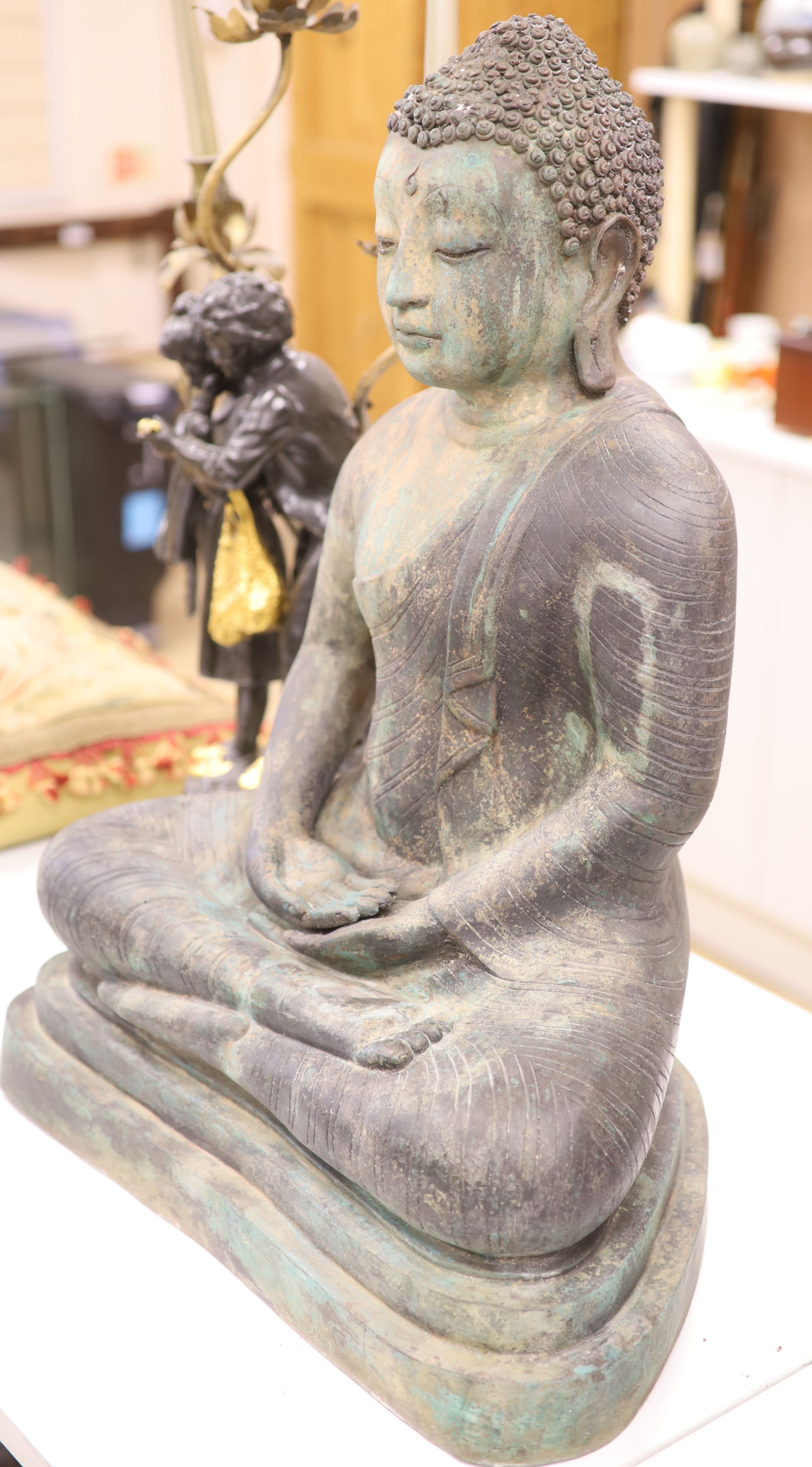 A Sino Tibetan bronze buddha, height 65cm